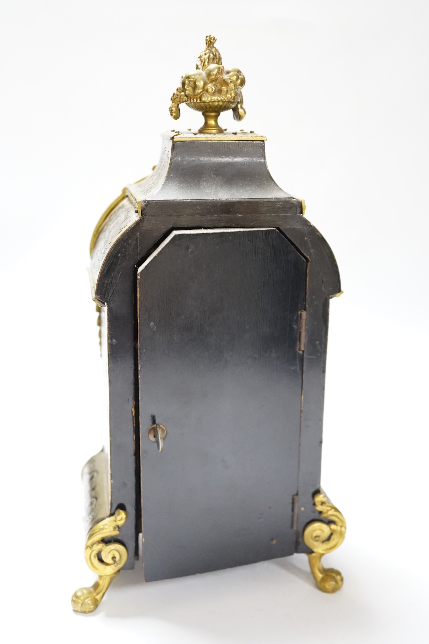 A late 19th century French cut brass inlaid mantel clock, 32cm high